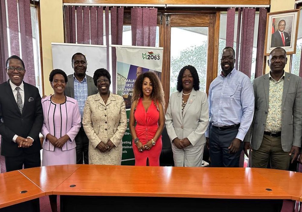 Hon. Olivia G., Partner DataSkillz, at the center of attention (in red attire), alongside the esteemed officials and leadership of Malawi. 
(#LearnAfrica Initiative)